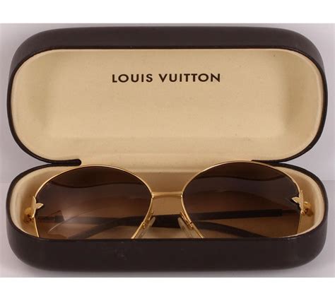 louis vuitton sunglasses gold frame|louis vuitton reflective glasses.